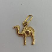 Egyptian yellow metal pendant in the form of a camel, 1.8grams