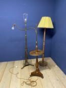 A good walnut and brass bound standard lamp, with a brass galleried tray to extending adjustable