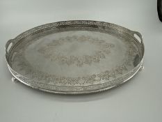 A collection of silver plated oval trays to include a pierced gallery example (5)