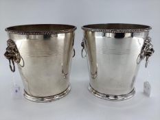 A pair of silver plated wine/ice buckets with lion head and hoop handles by Mappin & Webb, 23cm H