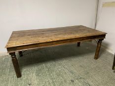 A large teak style rectangular table (one loose leg - needs attention)