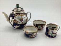A C19th Derby style part tea set , blue ground with gilt decoration with hand painted panels of