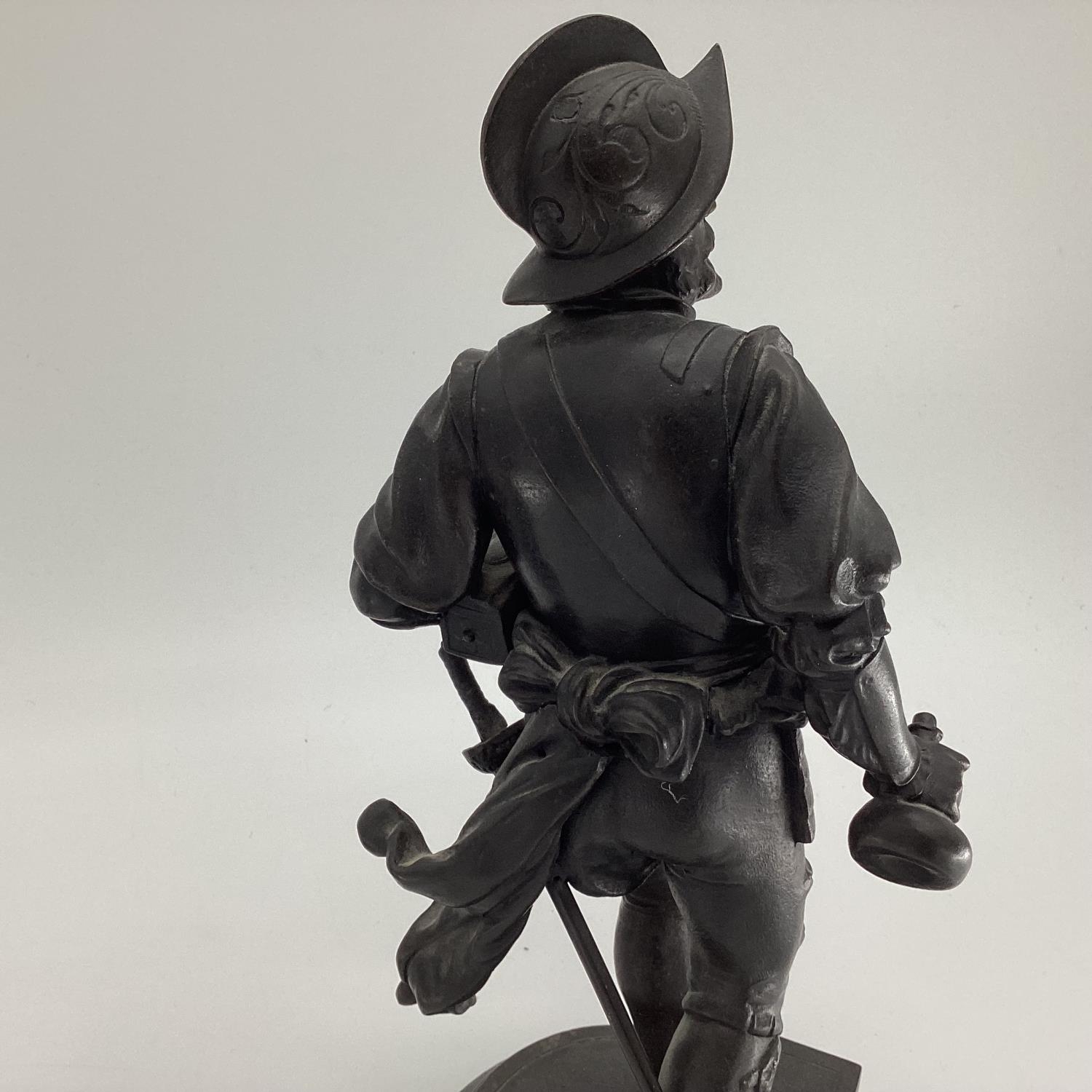 Two bronze figures of a cavalier and a soldier on cast oval bases, 37cm - Image 6 of 8