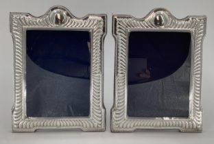 Pair of Sterling silver easel backed picture frames by Carrs Sheffield, 30 x 22cm