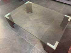 Designer Manhattan coffee table, with glass top raised on four Dark Oak legs H 45 W 140 D 75