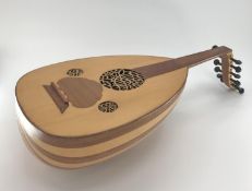 An Oud, with label to interior with date and provenance, and maker ( Bagdad, machine made, see