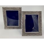 Pair of Turkish silver easel backed picture frames with shell and geometric design stamped Melda