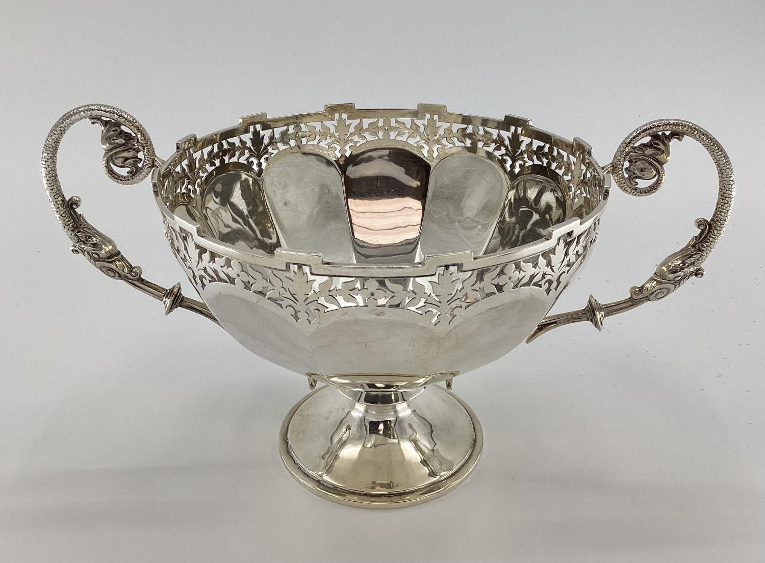 Stirling silver table centre bowl with pierced rim scrolling handles and circular foot ,37x23 x21cm,