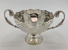 Stirling silver table centre bowl with pierced rim scrolling handles and circular foot ,37x23 x21cm,