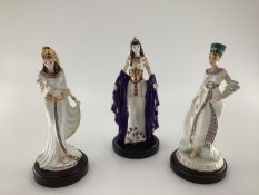 Two Coalport limited edition figures, Cleopatra and Queen Hatshepsut, and a Wedgwood Statue of