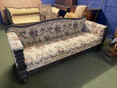 A South Asian style 3 seater upholstered show wood sofa, with reeded serpentine back and carved