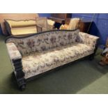 A South Asian style 3 seater upholstered show wood sofa, with reeded serpentine back and carved