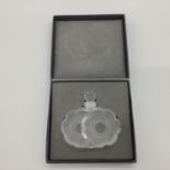A Lalique frosted glass perfume bottle of twin flower head design etched to base in original box,