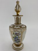 A late C19th/early C20th flash cut glass decanter, Polychrome painted with floral panels