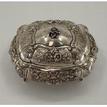 White metal Middle Eastern style domed shaped lidded jewellery casket, with cast rose finial on 4