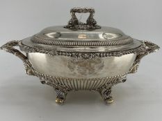 A collection of silver plated items to include two lidded tureens and other items