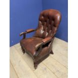 Victorian button back fireside library chair with original rexine or leatheretteupholstery, on