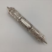 Silver Middle Eastern style Prayer Scroll with pierced and raised floral decoration stamped 900,