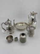 A collection of silver plated and pewter items to include a thermos water jug and oval bowl and a