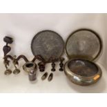 A quantity of Middle Eastern and South Asian brass and engraved metalware's to include bowls, trays,