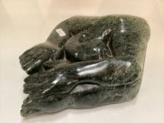 Gideon Nynhongo (born 1967) Reclining figure, abstract green marble sculpture, 46cmc 38cm