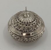 A silver circular bowl with pierced hinged lid and body stamped 925, 320g, 11cm x 12cm