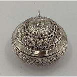 A silver circular bowl with pierced hinged lid and body stamped 925, 320g, 11cm x 12cm