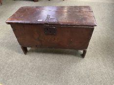 A small part C17th oak coffer with rising lid, with 1671 date carved to front, 77cmW x 33cmD x 48cmH