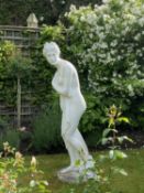 A white marble effect garden statue of Venus, after Canova