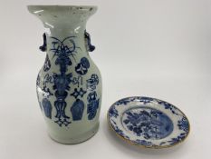 An oriental blue and celadon waisted vase, and a blue and white delft slipware plate, both with wear