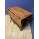 A teak style slatted drop leaf 2 tier kitchen trolley