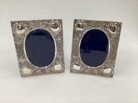 Pair of Turkish silver easel backed picture frames, with chased floral decoration, stamped Melda 900