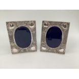 Pair of Turkish silver easel backed picture frames, with chased floral decoration, stamped Melda 900