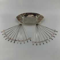 A white metal oval bowl with wheatsheaf design by Christofle France. 36 x 18cm, and a set of 22