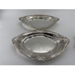 A collection of silver plate to include a pair of oval Elkington & Co dishes and circular footed