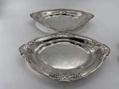 A collection of silver plate to include a pair of oval Elkington & Co dishes and circular footed