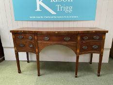 Victorian mahogany serpentine fronted sideboard of 4 drawers, one with dummy handles, and tapered