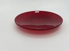 A Nonfoux circular red glass plate, etched and dated to rim 86, approx 31cm diameter