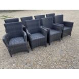 A good set of 8 wicker effect brown garden arm chairs, some minor wear to some legs where the