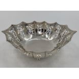 Silver pierced bowl raised on 4 scrolling feet, marked silver, 220grams, 25cmL x 19cmW x 7cmH