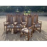 Very good set of ten oak high back Arts and Crafts style dining chairs, upholstered back and seat in