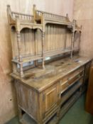 A good oak Arts and Craft style mirrored sideboard, with panelled and galleried top, the base of 3