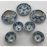 A quantity of blue and white china,  sauce plate diameter 13cm, cup 6cm high, sauces diameter 8cm