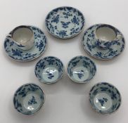 A quantity of blue and white china,  sauce plate diameter 13cm, cup 6cm high, sauces diameter 8cm