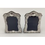 Pair of Sterling silver desk top easel back picture frames, with floral decoration, Sheffield