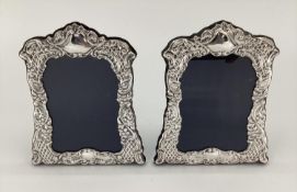 Pair of Sterling silver desk top easel back picture frames, with floral decoration, Sheffield