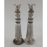 Pair of sterling silver candlesticks with sectional reeded design, stamped Lalaounis, Greece, 925