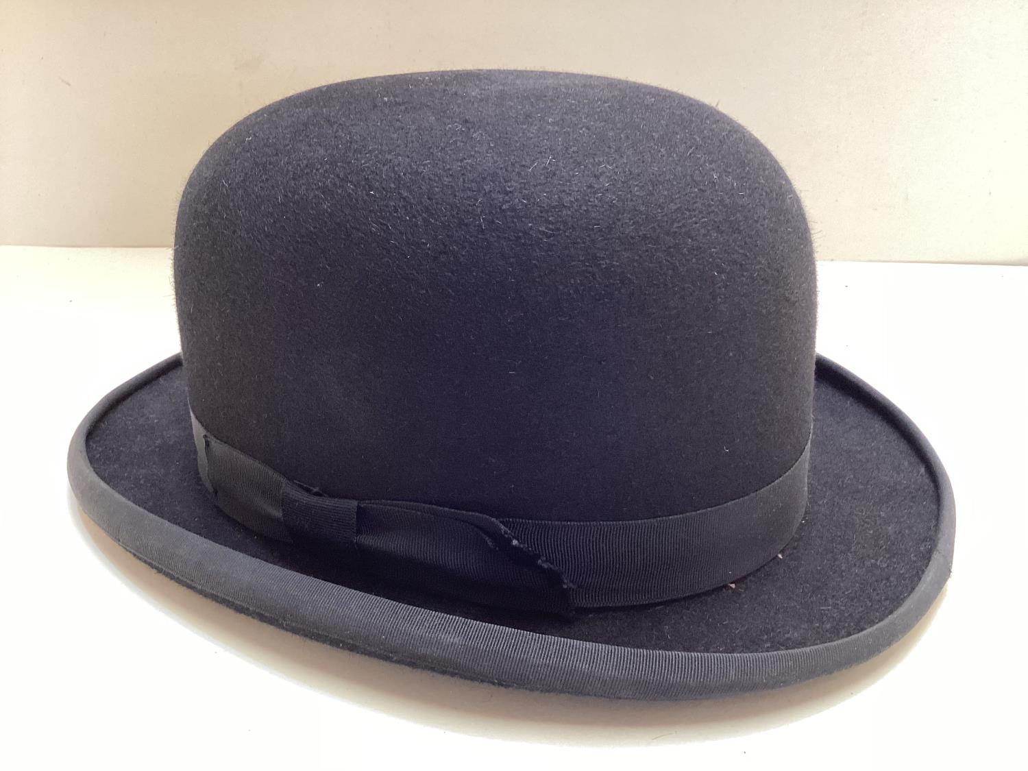 A large sized bowler hat, made by Christys', London size stamped 7 3/8, almost as new