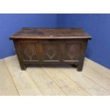 Part C18th oak coffer with 3 carved geometric panels, on raised legs, some splits and wear, 115cm