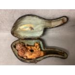 Late C19th early C20th Meersham pipe with Amber mouth piece and topped by a carving of a pig, in